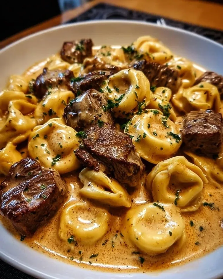 Cracked Garlic Steak Tortellini served in creamhouse sauce with herbs