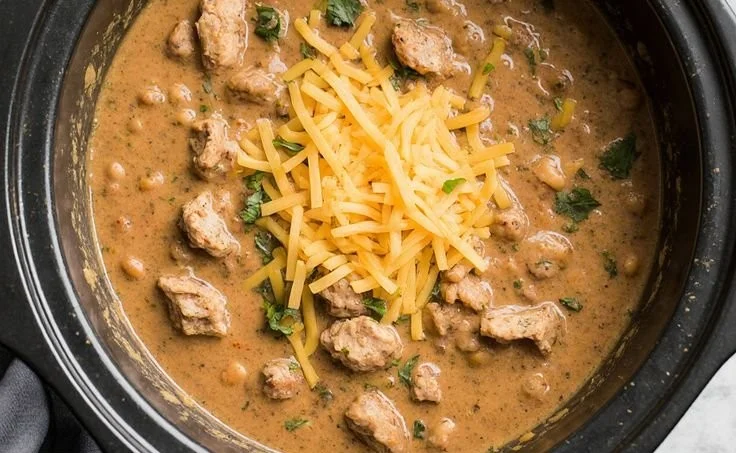Crockpot white chicken chili with fresh ingredients in a bowl