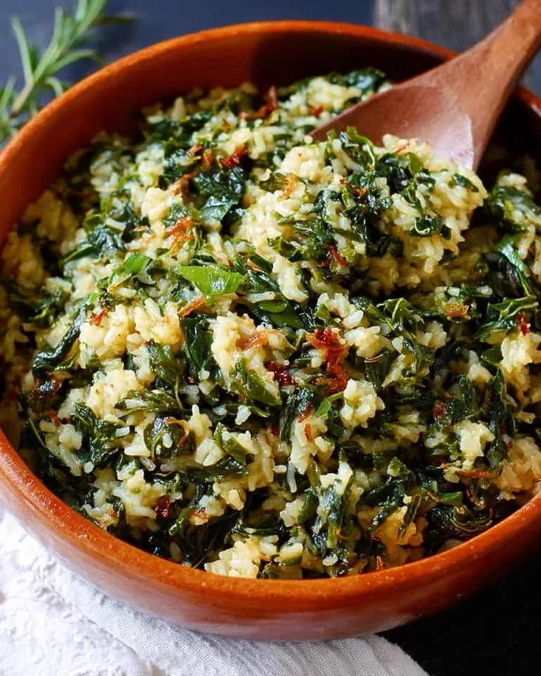 Plate of homemade collard green rice garnished with herbs