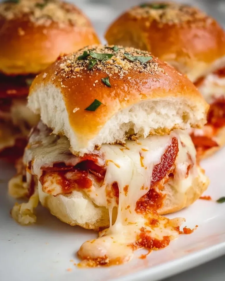 Tasty Pizza Sliders with melted cheese and toppings served on a platter