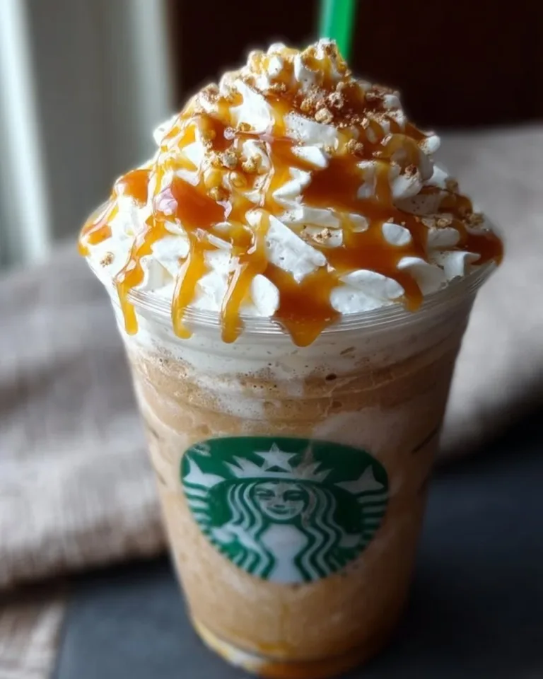 Homemade Copycat Starbucks Caramel Frappuccino with whipped cream and caramel drizzle.