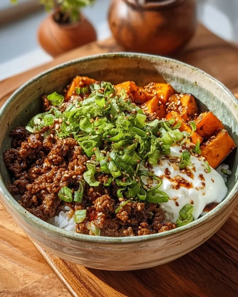 Delicious Ground Beef Hot Honey Bowl topped with spicy honey and fresh ingredients.