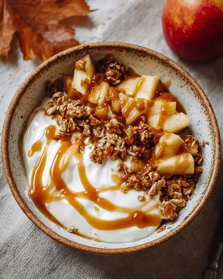 Caramel Apple Pie Yogurt Bowl with fresh apples, caramel drizzle, and creamy yogurt.